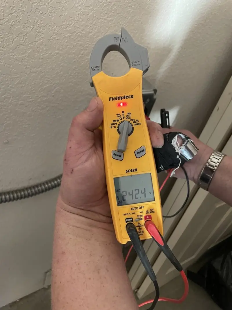 Voltage testing with clamp meter during Recessed Lighting Installation in Spring Lake Heights